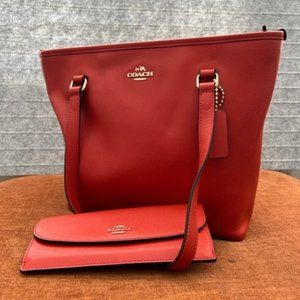 Coach burnt orange purse with wallet